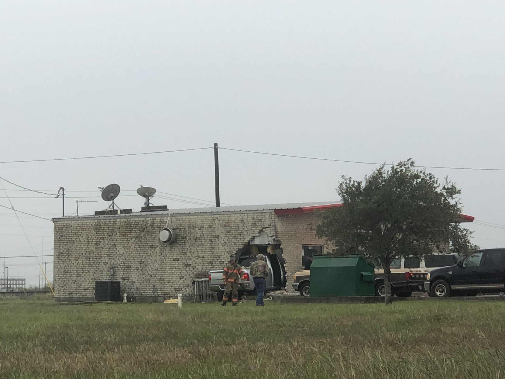 Pickup crashes into gas station